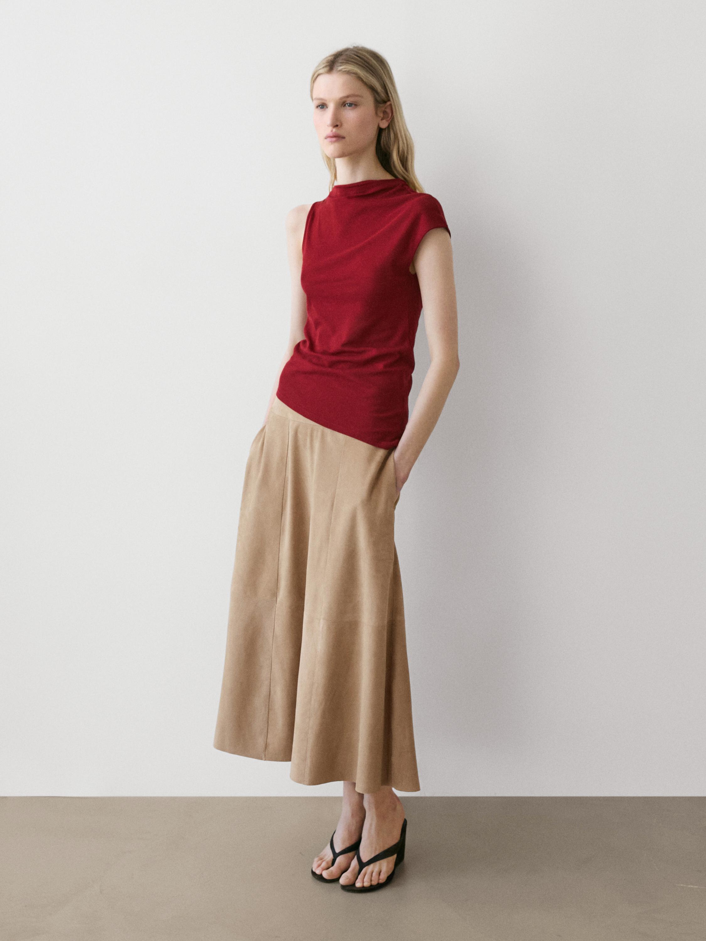 100% cotton top with asymmetric detail